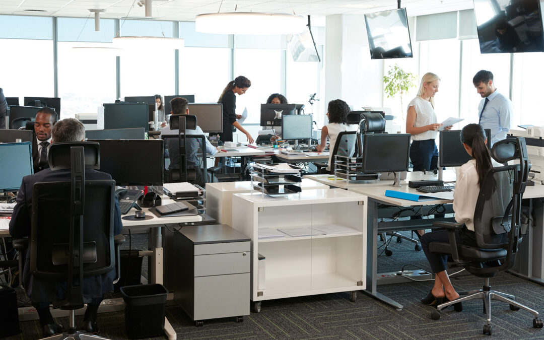 people working on computers in a modern office